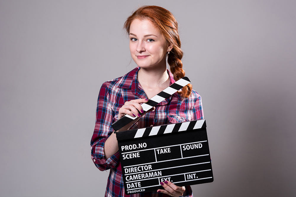 Woman doing a film at Virtually Talented Online Team Event