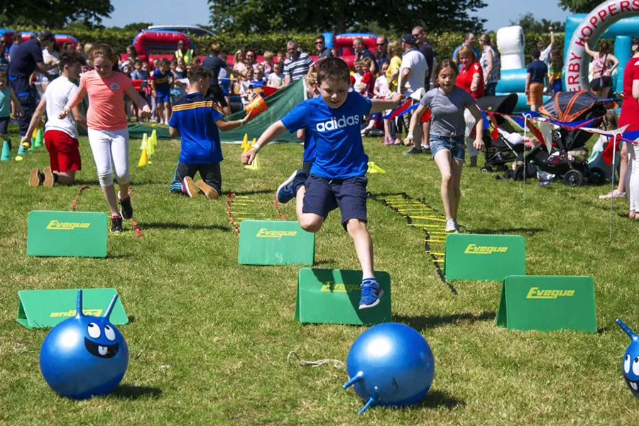 Kids racing at Family Fun Day Event